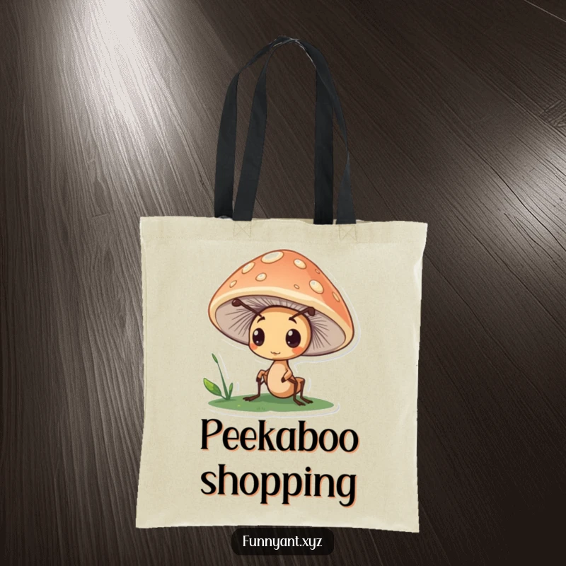 Funny tote bag featuring a cute ant character curiously peeking from under a mushroom cap, perfect for carrying discoveries with a smile.
